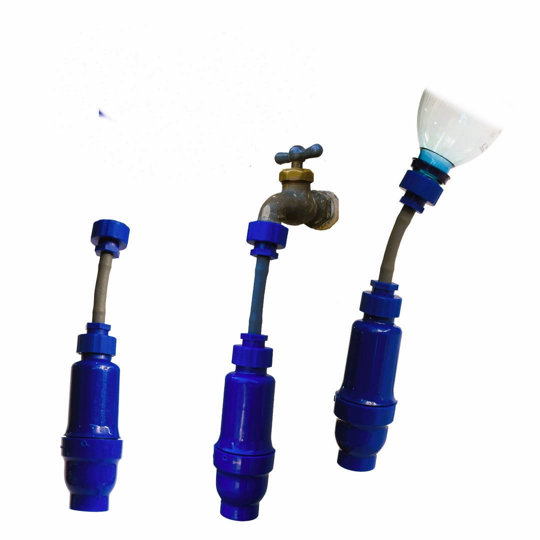 The filter shown with its bucket, garden tap and kitchen tap adapters
